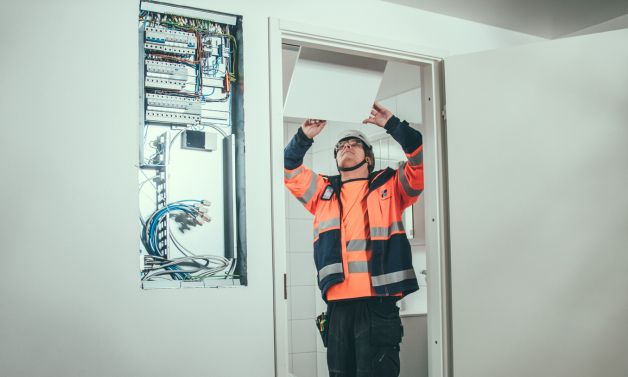 Inspecting a bathroom pod at a construction site